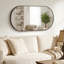 Miroir mural ovale en métal-794365165