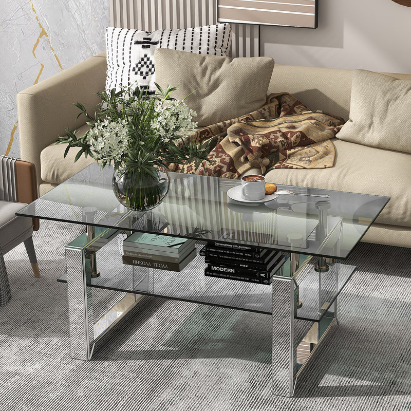 Table basse rectangulaire avec plateau en verre et tablette