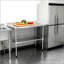 Table de travail durable en acier inoxydable de calibre 18 de 24 po x 48 po avec dosseret de 4 po et tablette inférieure pour une utilisation efficace dans la cuisine