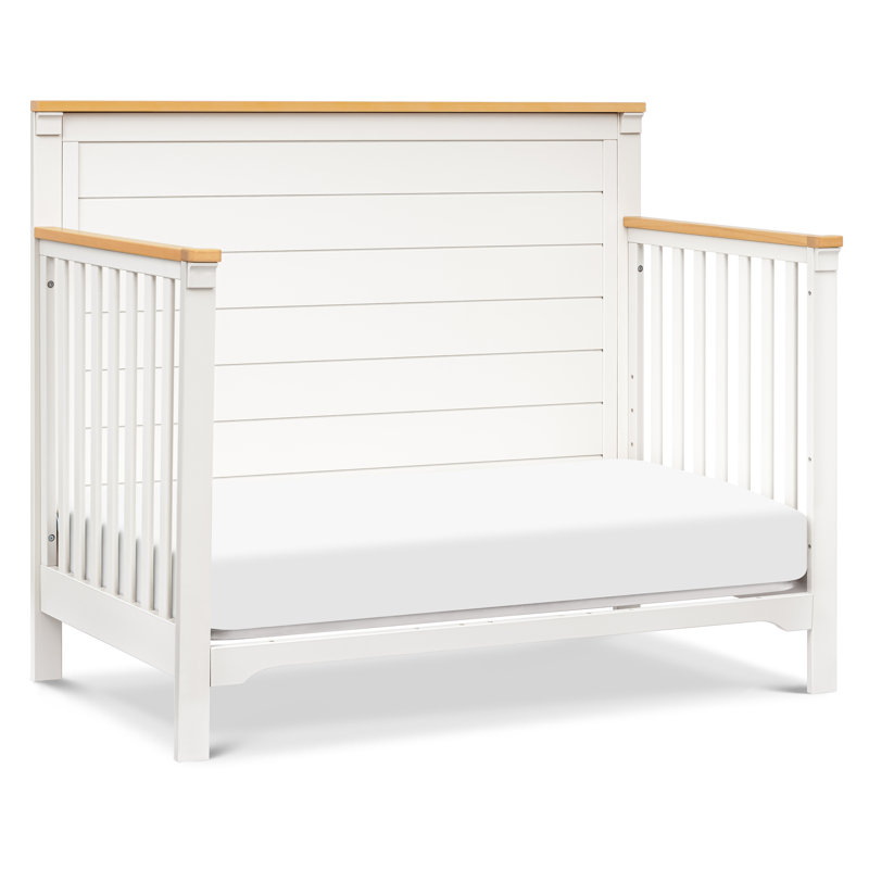 Warm White and Honey 4-in-1 Convertible Crib with Wood Paneling