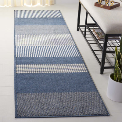 Tapis ivoire / bleu marine en polypropylène tissé à la machine Nicarete