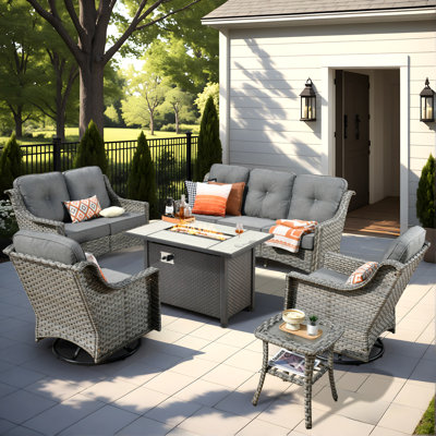 Demariea Outdoor Wicker 7 Person Seating Group With Fire Pit Table With Rocking And Swivel Chairs by Lark Manor