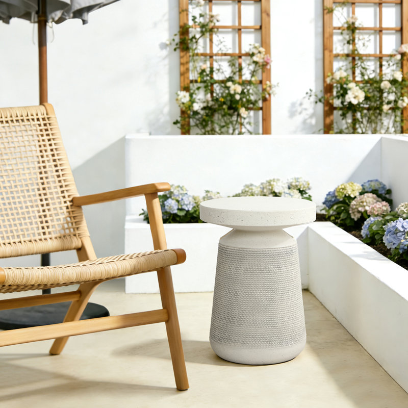 Textured Faux Stone Patio Table, Japandi Style with Sculpted Rope-Look Base