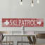 « ski patrol », art textuel sur bois