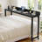 70.8" Overbed Table with 360° Wheels, Queen Size Mobile Bed Desk with Heavy Duty Metal Leg, Sturdy Laptop Cart & Dining Table for Bedroom, Living Room, Hospital Use (Black)