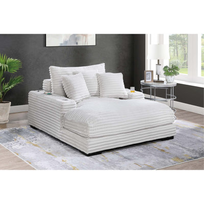 Chaise longue jumbo en velours côtelé, aspect fourrure taupe, 2 porte-gobelets, ports USB, pieds en bois, style moderne et confortable