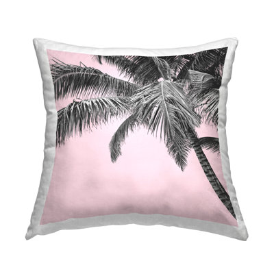 Coussin tropical imprimé à motif de palmiers roses par Elephant Stock