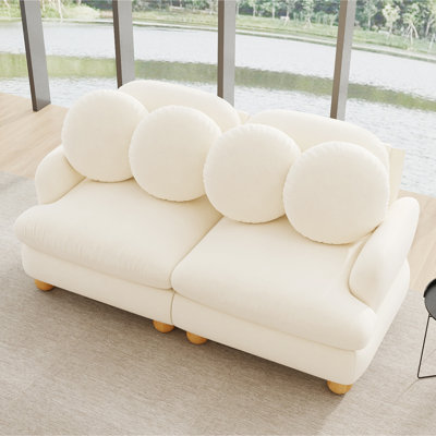 Canapé d'angle modulaire 2 places en chenille beige, 173 cm, assise profonde et 4 coussins décoratifs inclus.