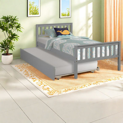 Lits simples à gigogne avec lit gigogne en bois gris, design moderne pour les petits espaces