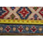 Tapis rouge à motif oriental Kazak