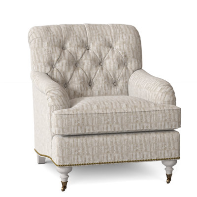 Fauteuil à coussin en duvet capitonné Devan