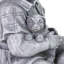 Statue garçon avec chiot