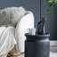Table d'appoint cylindrique en bois noir