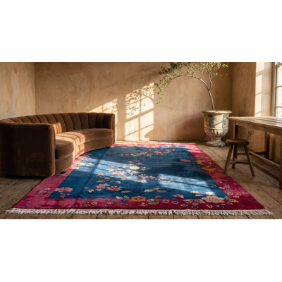 Tapis bleu antique en laine à motif art déco