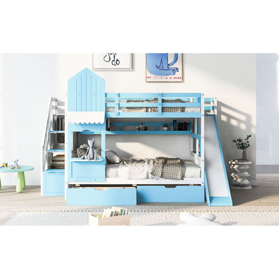 Lit superposé bleu avec rangement. Bois massif. Conception de maisonnette. Pour plus de 6 personnes. Capacité de 400 lb. Pas de sommier tapissier. Matelas non fourni. 2 tiroirs et 3 tablettes de L 106,3 po x l 76,6 po x H 72,8 po