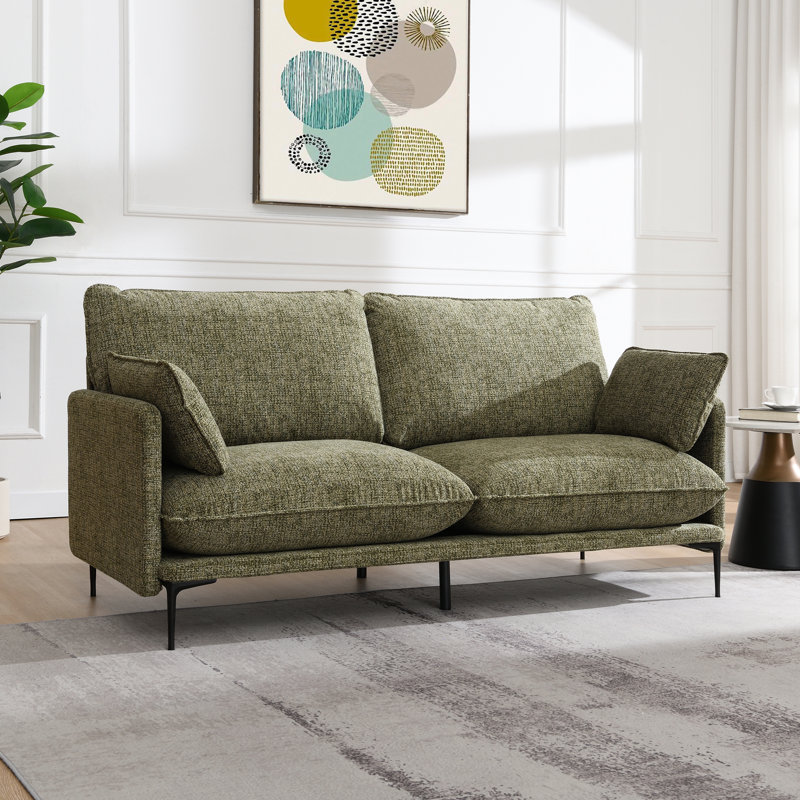 Canapé en tissu vert avec 2 coussins compressés Dalton