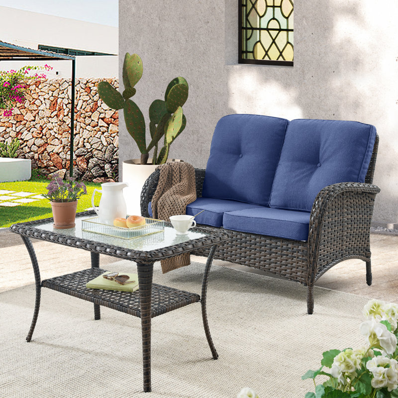 Esquer Brown Rattan Patio Loveseat with Cushions, Blue