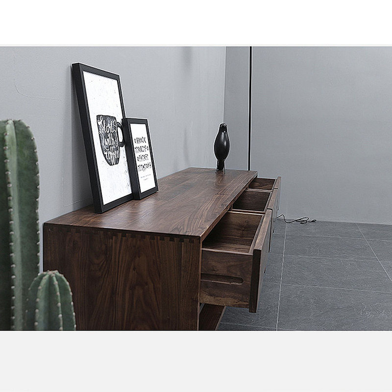 Cabinet audiovisuel noir avec tiroir en noyer