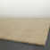 Lansvale Handmade Braided Wool Beige Area Rug