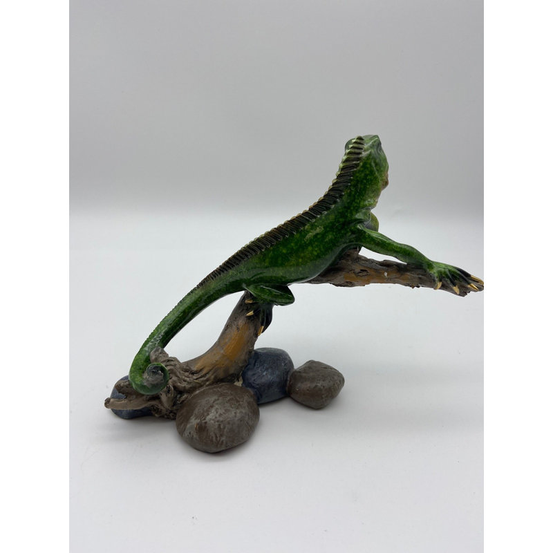 Figurine iguane sur branche