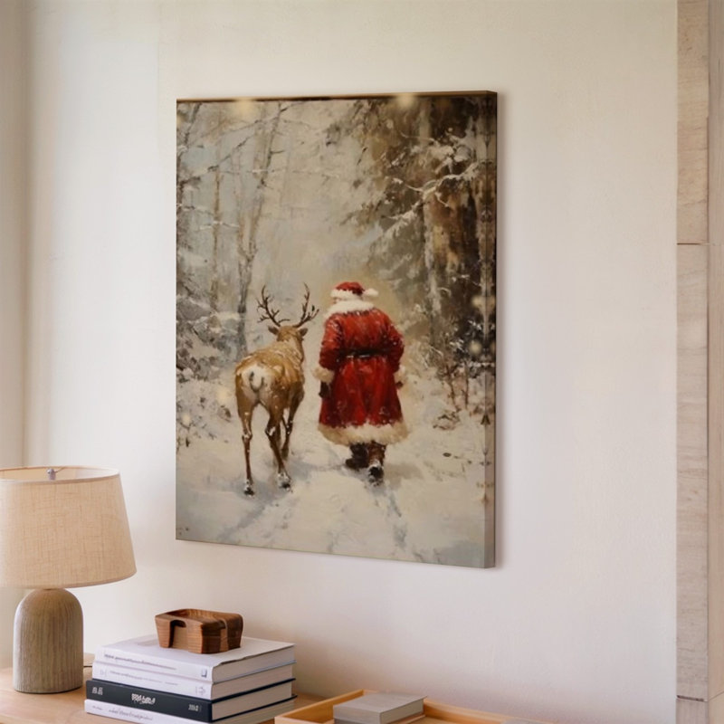 Toile «A Cosy Winter Scene Doté d'une figure dans un art mural rouge avec bordure blanche marchant le long d'un doux renne à travers l'art mural