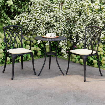 East Orland 2 - Person Patio Dining Set with Round Table , Cushions Included