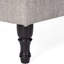 Housse gracieuse en tissu gris avec capitonnage et housse de rangement cachée