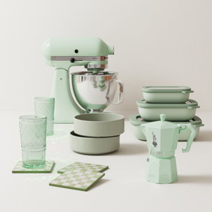 Kitchen appliances and homewares in pale green.