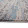 Mackensy Abstract Blue Power-Loom Area Rug