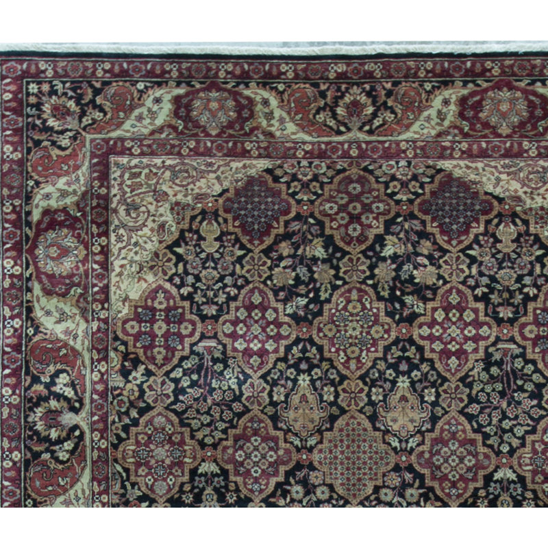 Lamani Wool Oriental Area Rug in Black/Red/Beige/Green