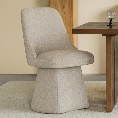 Chaise pivotante rembourrée en tissu