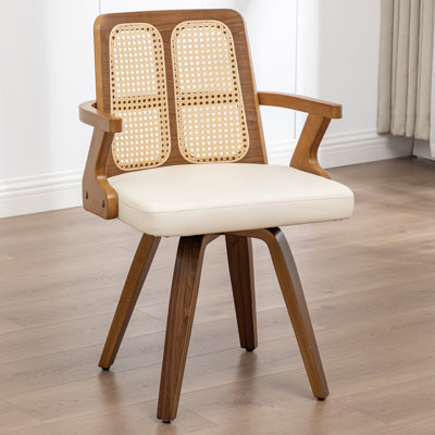 Chaise moderne rembourrée en similicuir à dossier en rotin