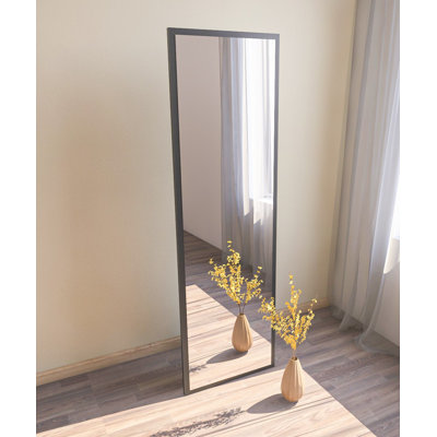 Elegant Floor Standing Mirror, Black, 19.7 x 63.0 x 0.9 inches | 100% MDF with Ecological Flotal-E Glass | Wall-Mountable Option | Modern Design for Home Decor & Dressing Rooms, Stylish & Functional