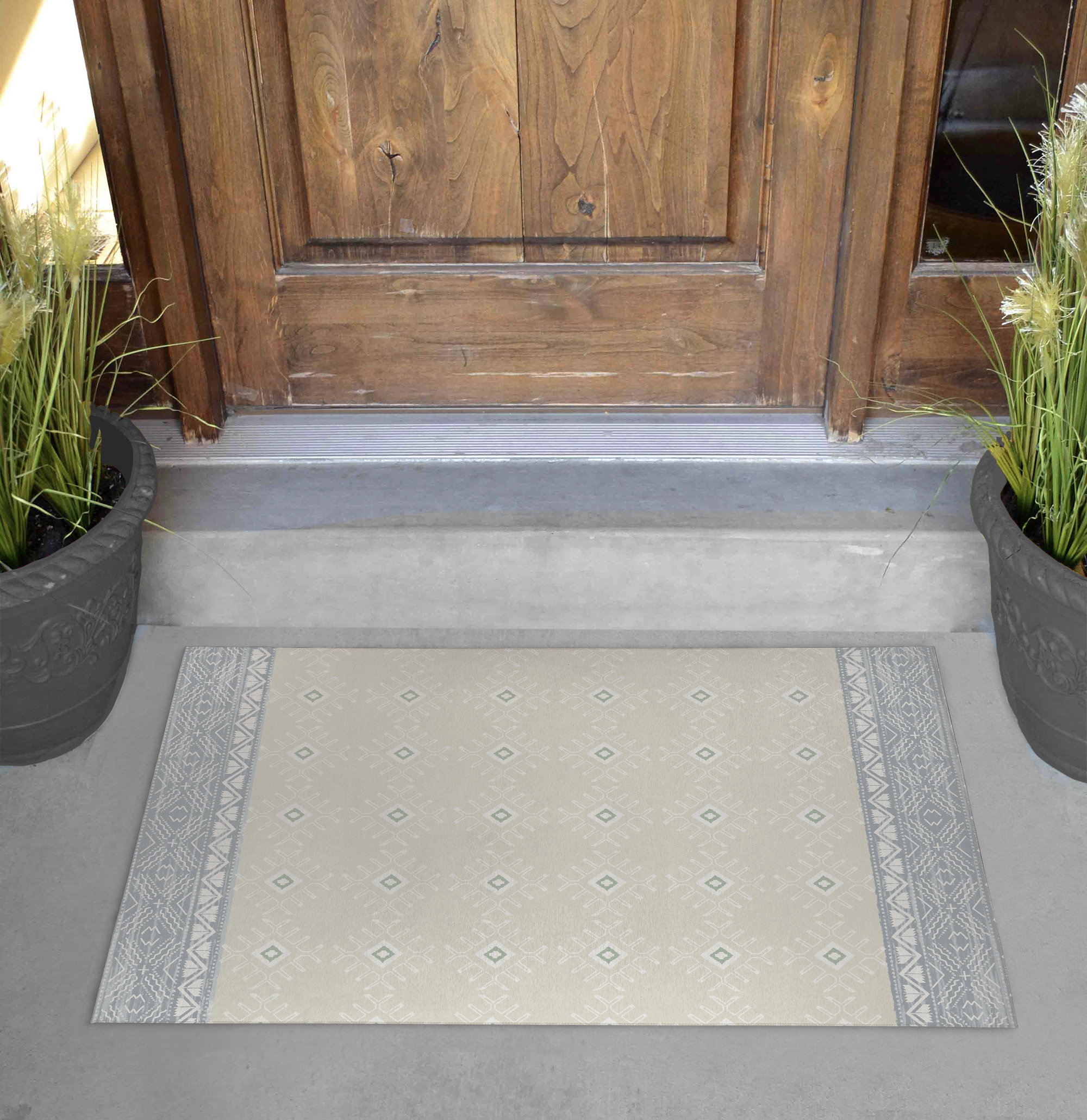 https://assets.wfcdn.com/im/53119077/compr-r85/1535/153582946/kimihiko-non-slip-geometric-outdoor-doormat.jpg