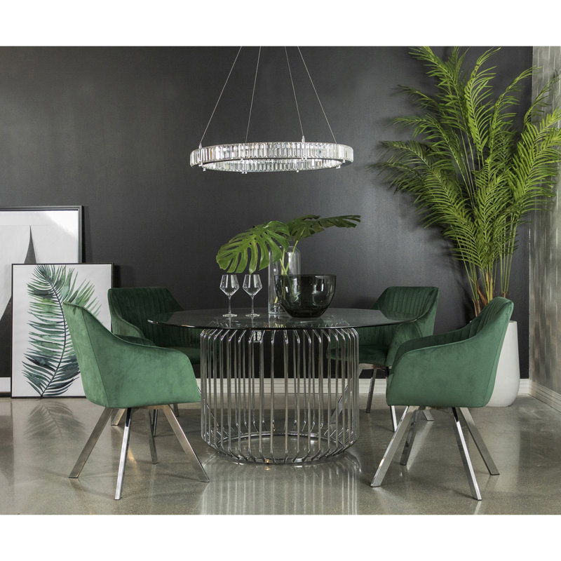 Fauteuil en velours vert foncé