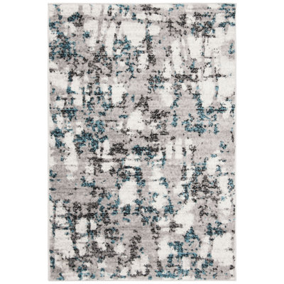 Tapis abstrait gris / bleu Strasser