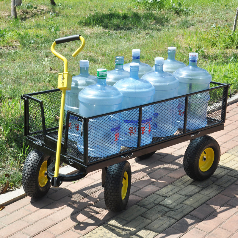 Les chariots de jardin BIG Wagon Cart facilitent le transport du bois de chauffage jaune et noir. La charge statique maximale est de 880 lb.