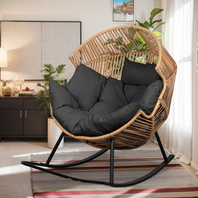 Fauteuil à bascule d'extérieur avec coussin Calcedonio