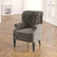 Fauteuil à oreilles en velours capitonné Korin-22741964