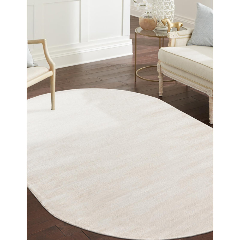 Tapis ivoire tissé à la machine de couleur unie Mclellan, Ovale 4 pi 1 po x 6 pi 1 po