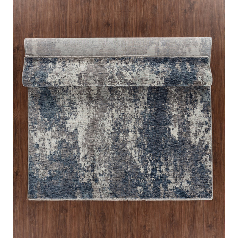 Tapis bleu tissé à la machine Ginsberg, Rectangle 5 pi 10 po x 8 pi 10 po