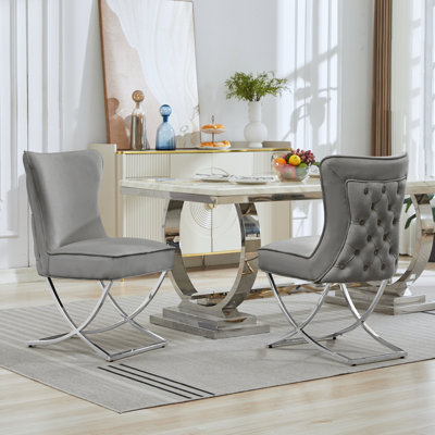 Chaise parsons rembourrée en velours capitonné Chary
