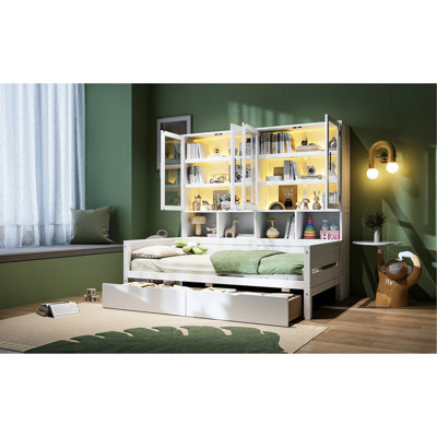 Lit de jour simple avec construction en bois blanc et rangement lumineux à DEL