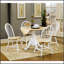 Ensemble repas 5 pièces Greer Natural Brown avec plateau rond lisse et chaises ergonomiques pour des repas confortables