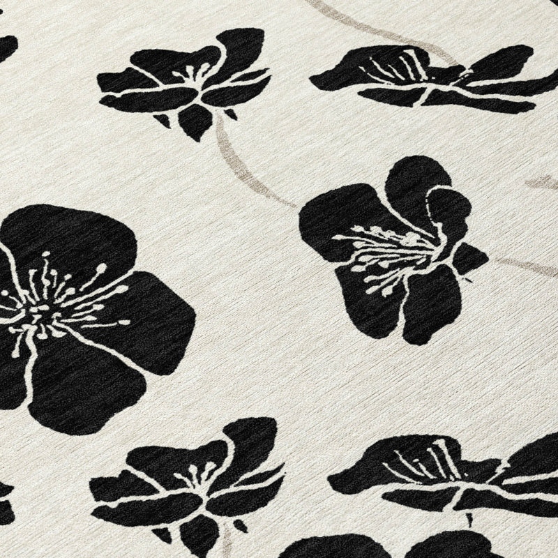 Ivory and Black Floral Synthetic Washable Rectangular Rug