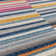 Donnavon Striped Blue/Pink/Yellow Area Rug