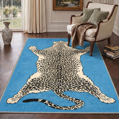  Tapis bleu / beige / noir à motif animalier Alinda Talon