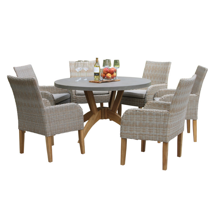 Akiva 52'' Round 6 - Person Outdoor Dining Set with Sunbrella Cushions