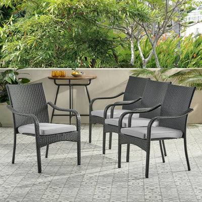Ensemble de 4 chaises de patio empilables en rotin PE avec structure en fer et coussins