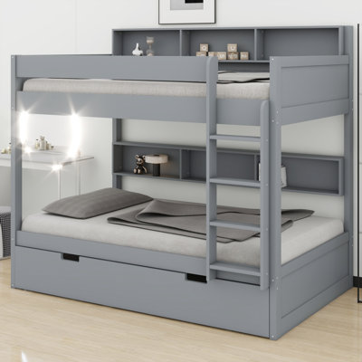 Space-Saving Bunk Bed with Trundle and Storage Shelves